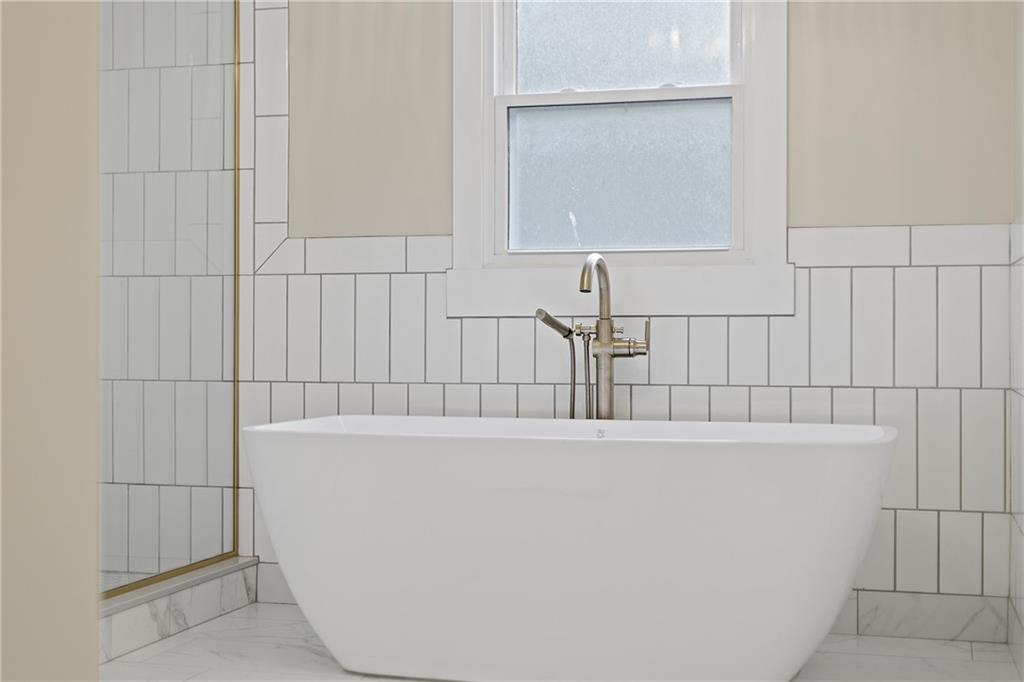 103 Main Street Ambridge, PA 15003 - Photo 26 of 49 a bathroom with a bathtub