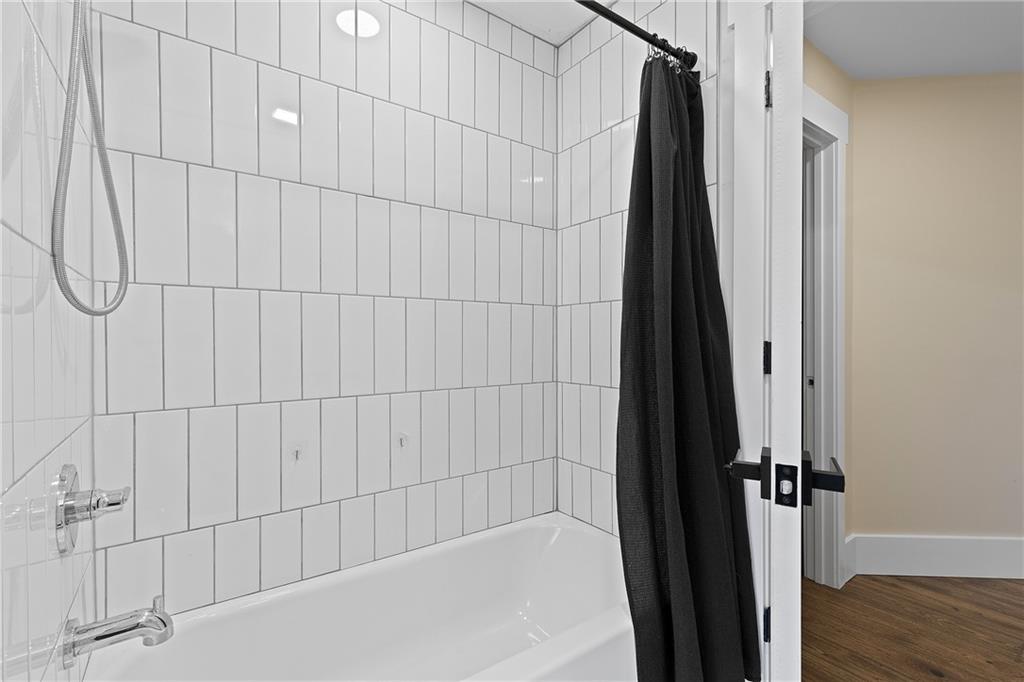 103 Main Street Ambridge, PA 15003 - Photo 29 of 49 a bathroom with a bathtub