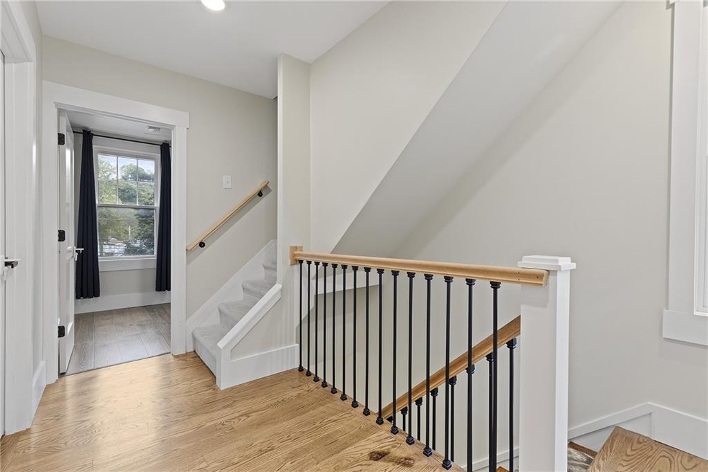 103 Main Street Ambridge, PA 15003 - Photo 30 of 49 a view of staircase with railing and white walls