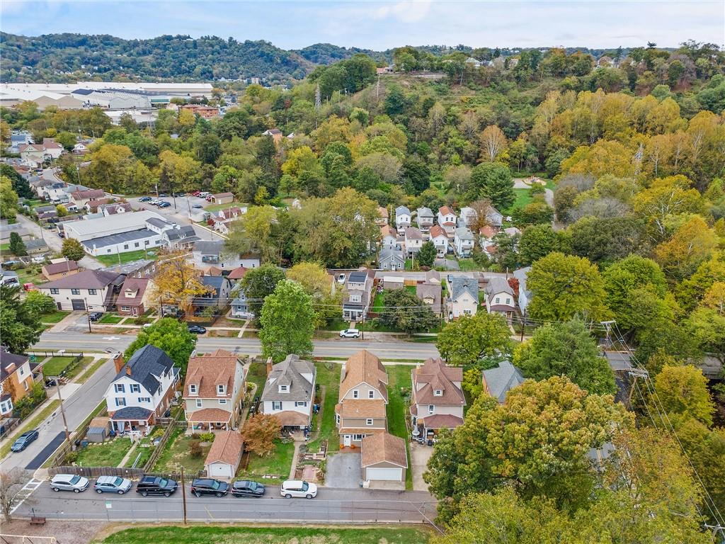 103 Main Street Ambridge, PA 15003 - Photo 44 of 49 an aerial view of residential building with outdoor space and river