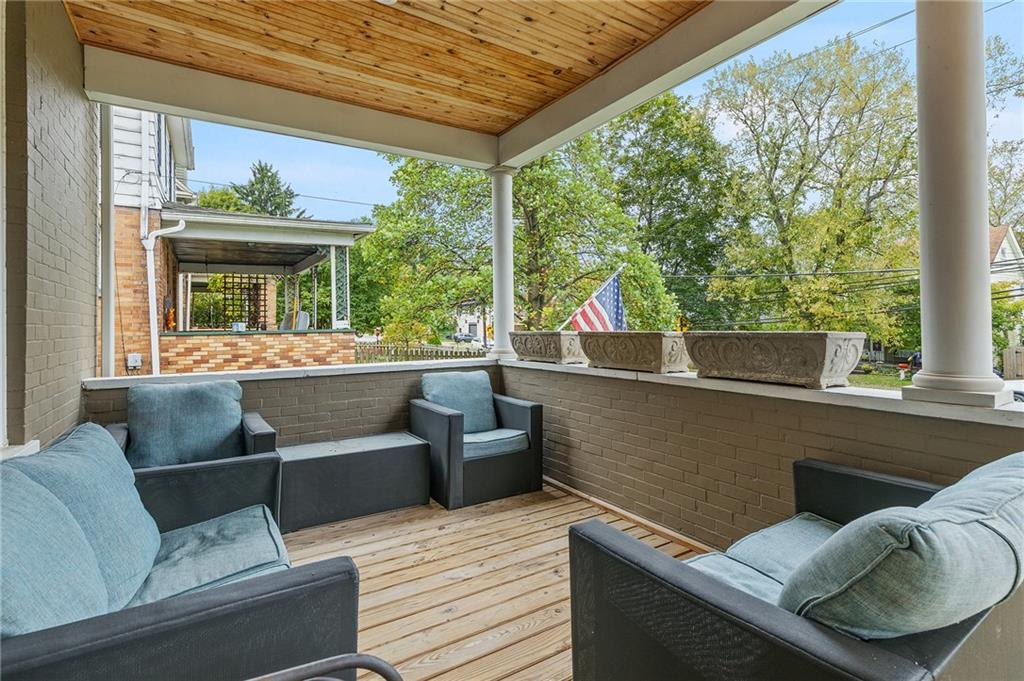 103 Main Street Ambridge, PA 15003 - Photo 6 of 49 a view of a patio with couches and potted plants