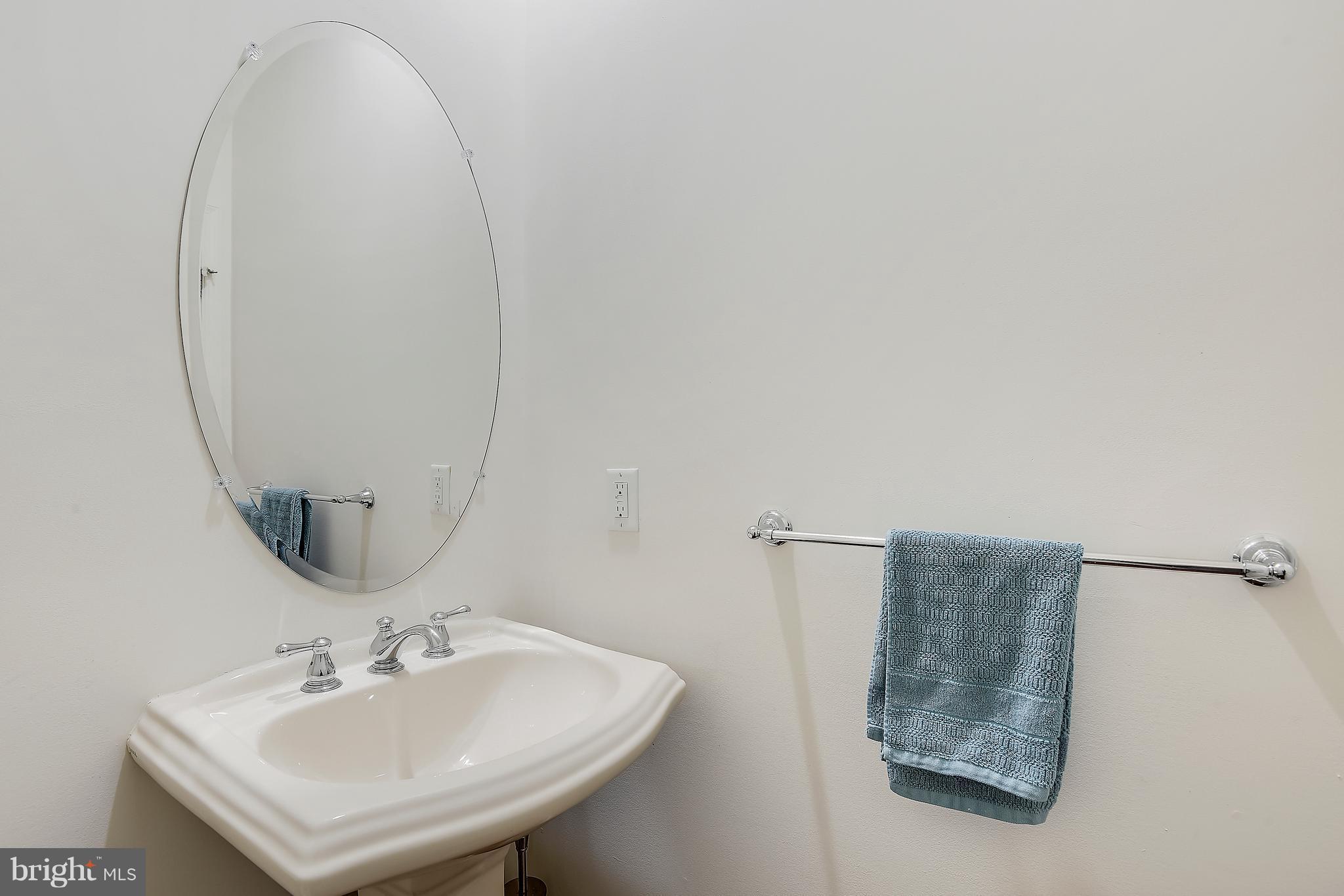 13612 Stargazer Lane Silver Spring, MD 20906 - Photo 14 of 30 a bathroom with a sink and a mirror