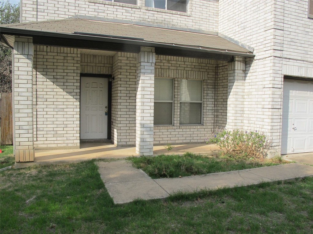 2011 Jasper Lane Cedar Park, TX 78613 - Photo 2 of 40 a front view of a house with garden