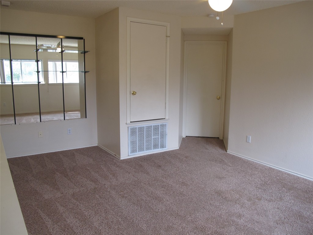 2011 Jasper Lane Cedar Park, TX 78613 - Photo 22 of 40 an empty room with windows
