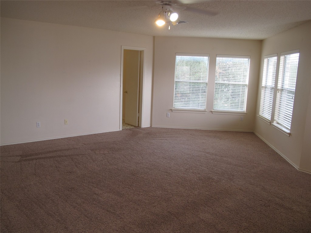 2011 Jasper Lane Cedar Park, TX 78613 - Photo 24 of 40 a view of an empty room with a window