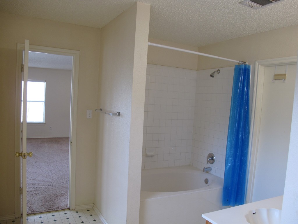 2011 Jasper Lane Cedar Park, TX 78613 - Photo 28 of 40 a bathroom with a bathtub