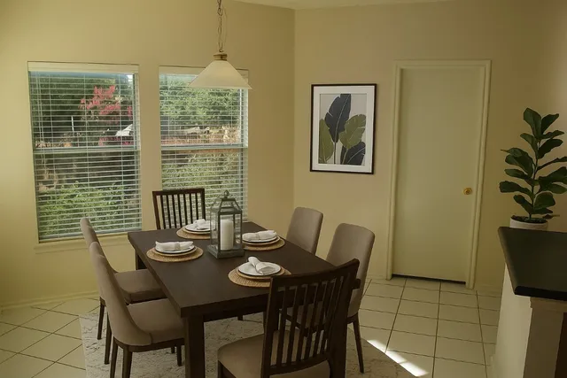 a view of an empty room with windows