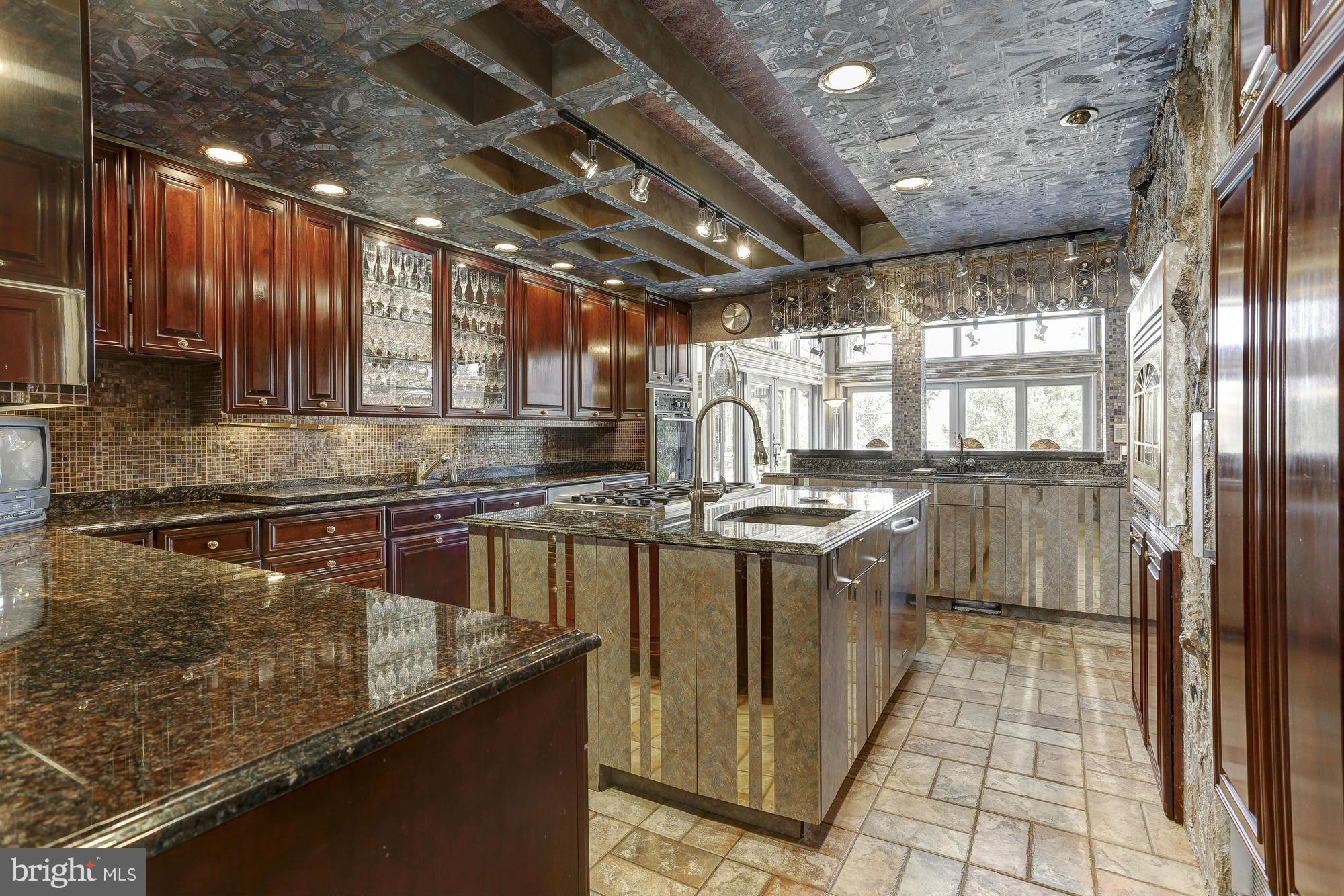 1901 Pot Spring Road Lutherville-Timonium, MD 21093 - Photo 8 of 30 Cooking island with sink, 6-burner Dacor cooktop