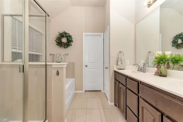 a bathroom with a sink and mirror