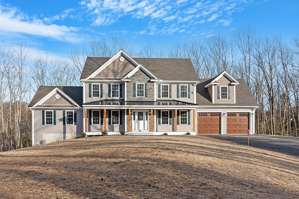 2 Davis Road Westminster, MA 01473 - Photo 1 of 41 a front view of a house with a garden