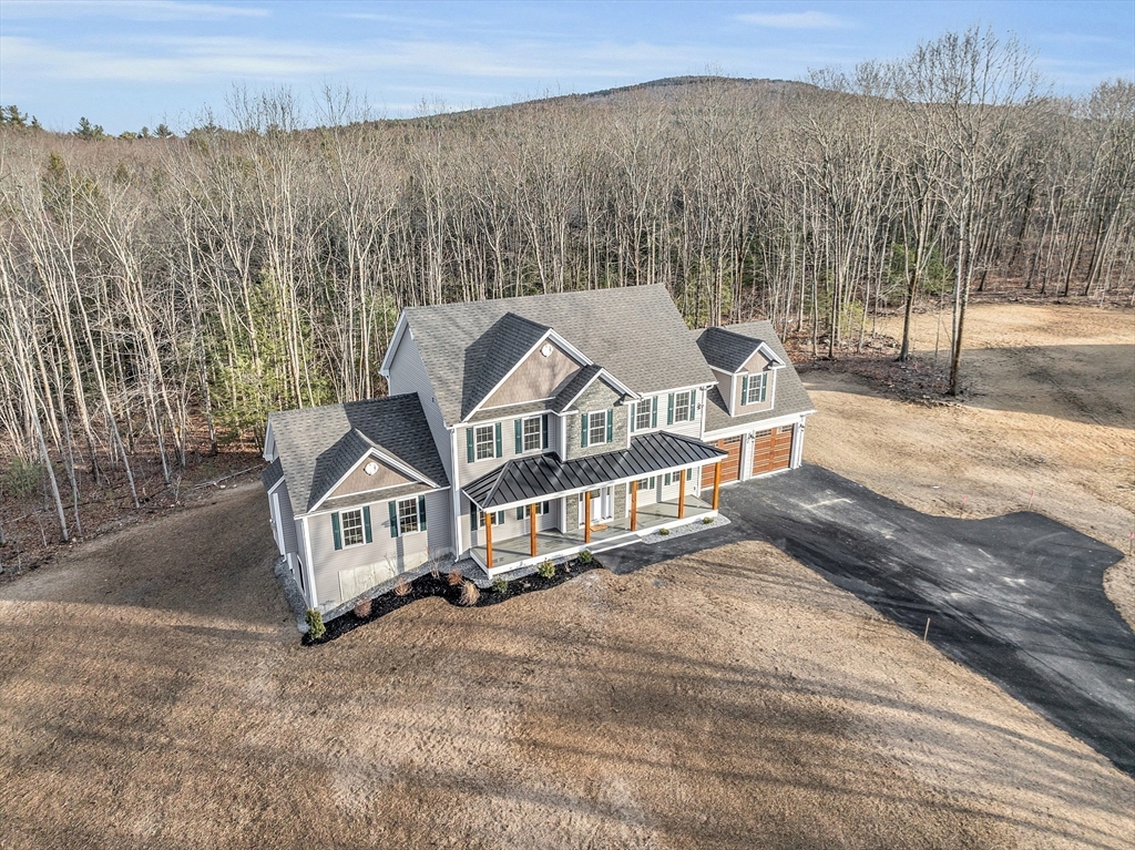 2 Davis Road Westminster, MA 01473 - Photo 2 of 41 a white house that has a tree in front of it