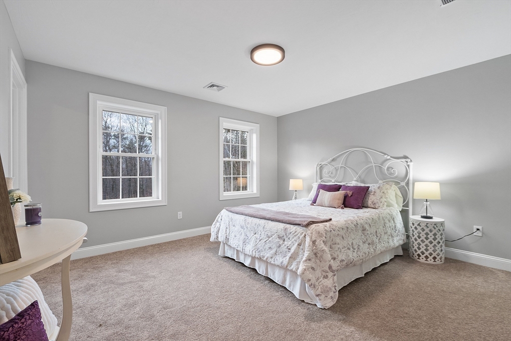 2 Davis Road Westminster, MA 01473 - Photo 28 of 41 a bedroom with a bed and a window