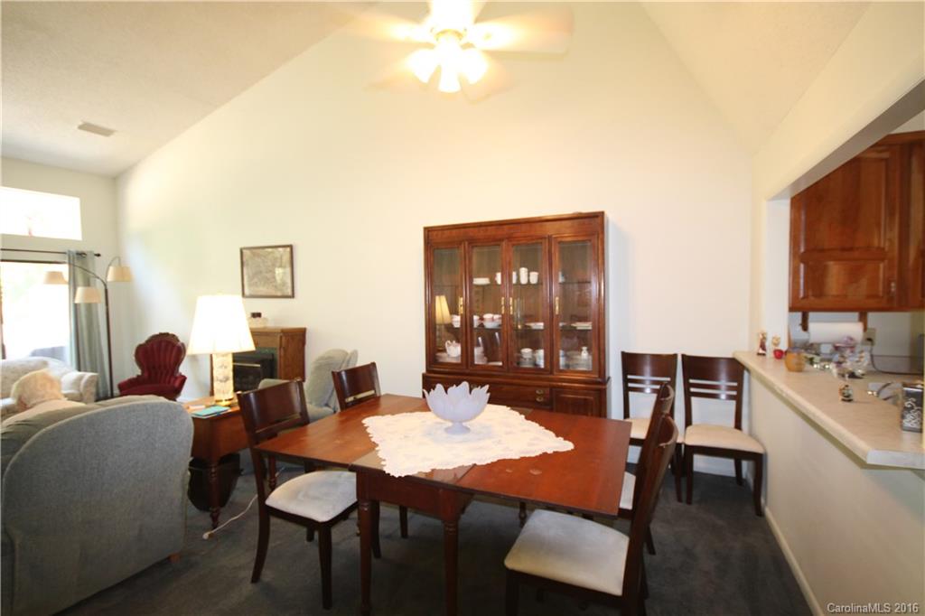 33 Old Post Road, Unit 33 Lake Wylie, SC 29710 - Photo 4 of 15 a view of a dining room with furniture and window