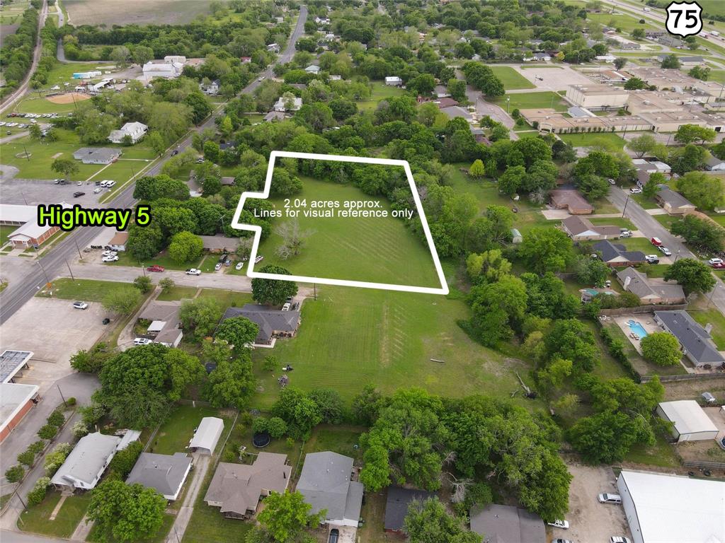 Tbd West Davis Street Howe, TX 75459 - Photo 3 of 4 an aerial view of a house with a yard
