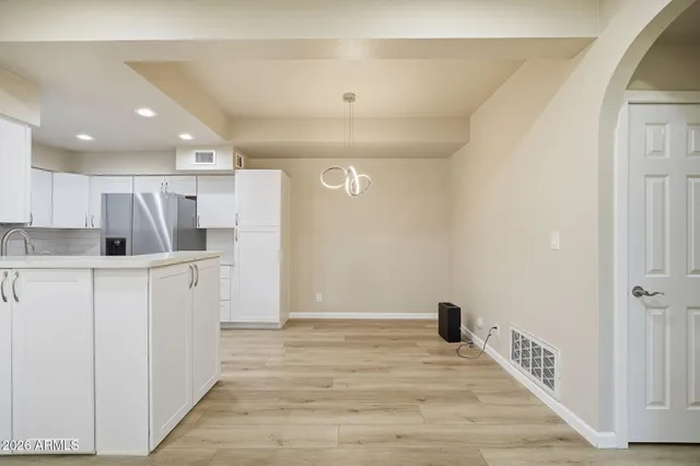 a view of kitchen with wooden floor