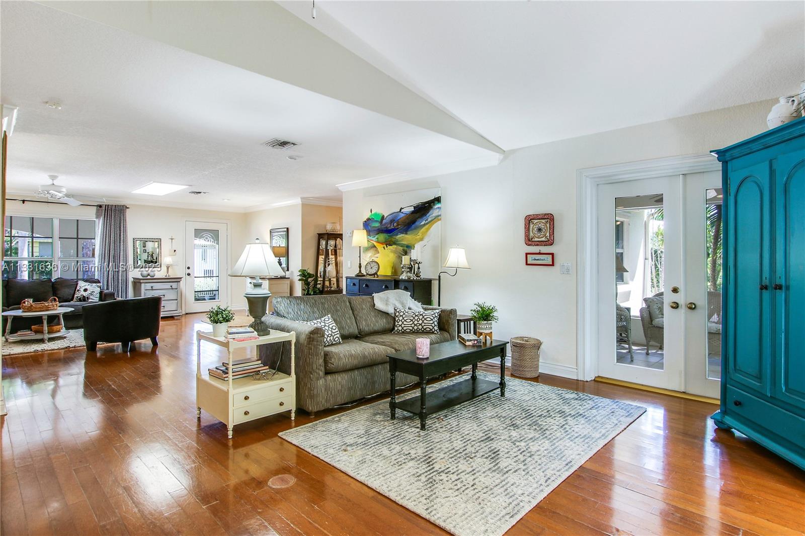 361 Zenith Lane Juno Beach, FL 33408 - Photo 15 of 36 a living room with furniture and wooden floor