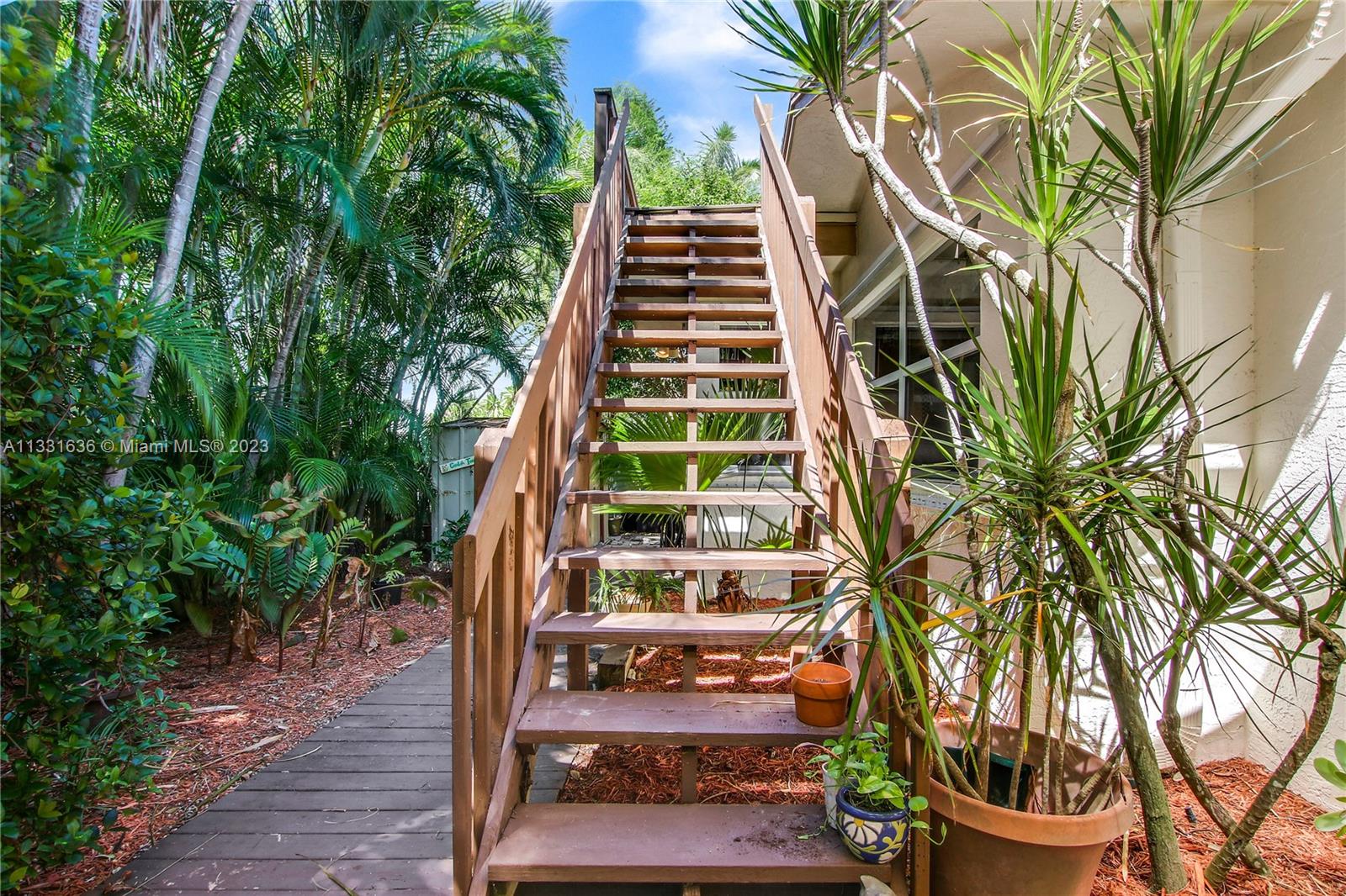 361 Zenith Lane Juno Beach, FL 33408 - Photo 26 of 36 a view of outdoor space yard and porch