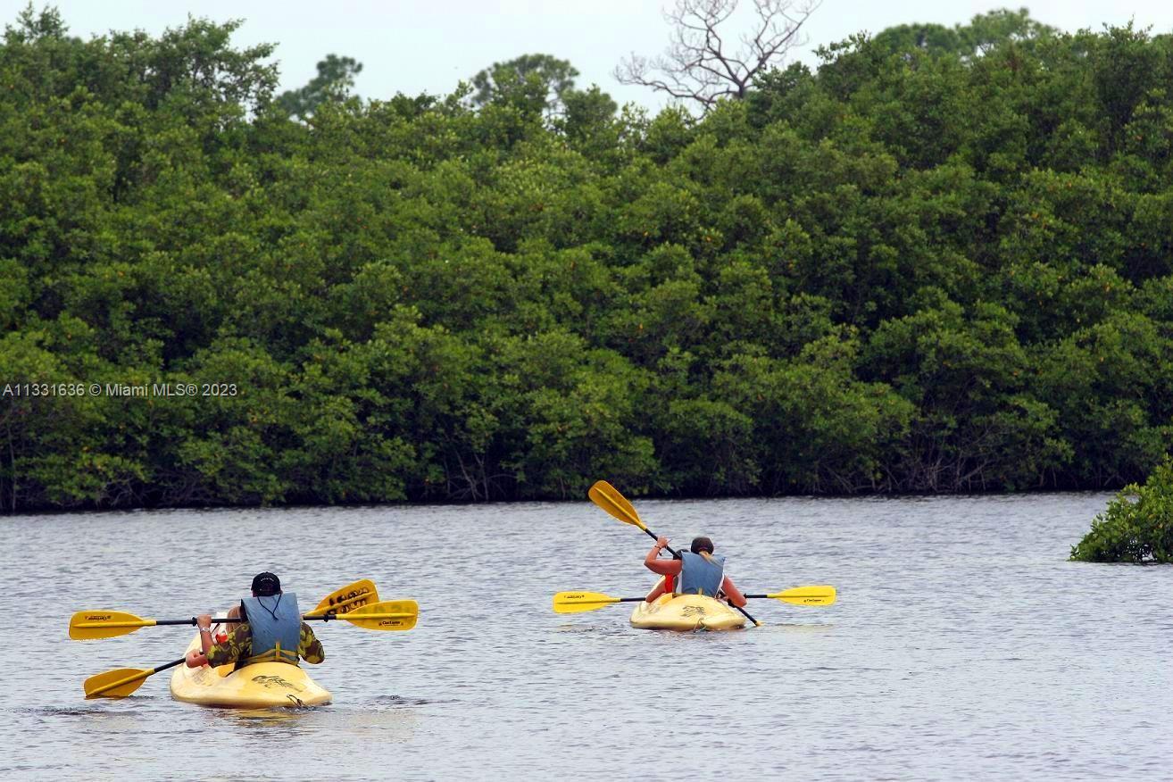 361 Zenith Lane Juno Beach, FL 33408 - Photo 35 of 36 a view of a swimming pool with a patio