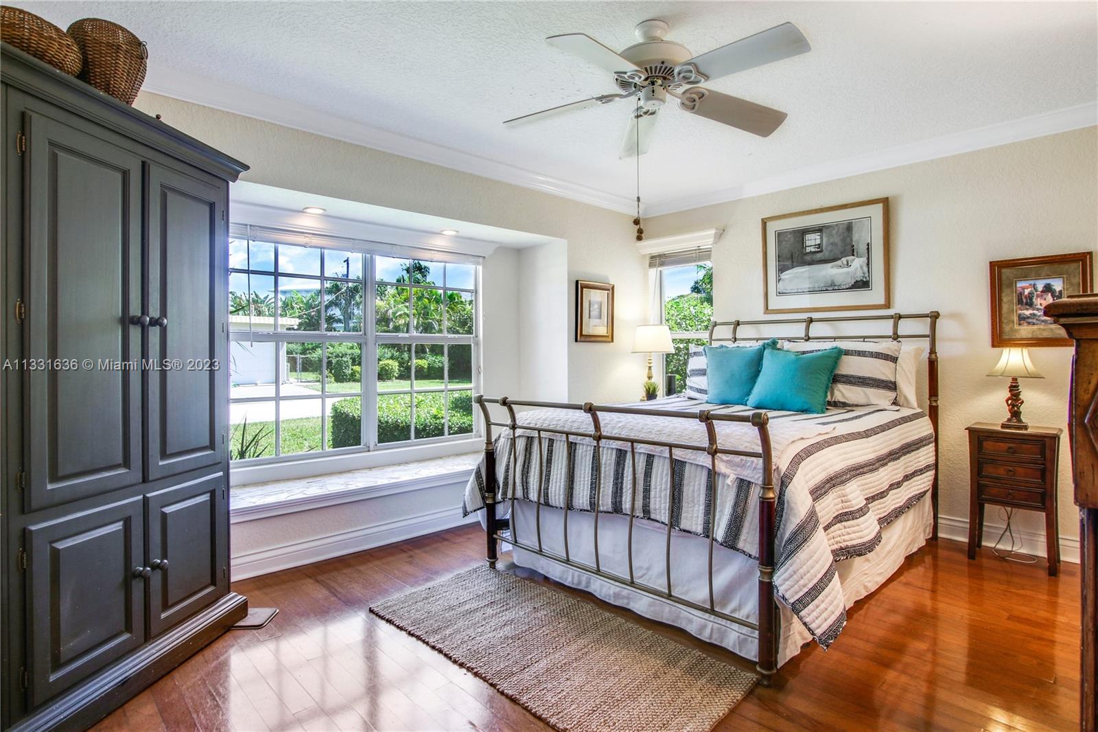361 Zenith Lane Juno Beach, FL 33408 - Photo 9 of 36 a bed room with a bed and a window