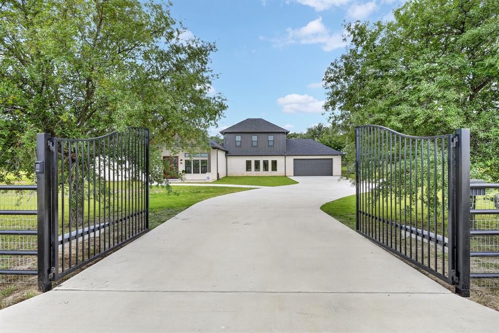 10373 Bobbie Lane Pilot Point, TX 76258 - Photo 4 of 40 Gorgeous newly constructed home with secured gate welcomes you!