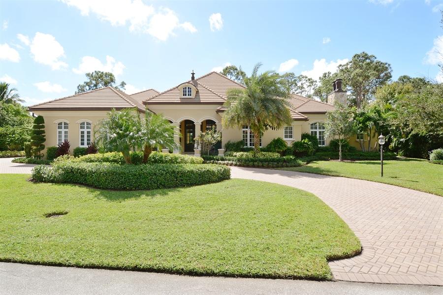 7770 Old Marsh Road Palm Beach Gardens, FL 33418 - Photo 1 of 23 old marsh front of house