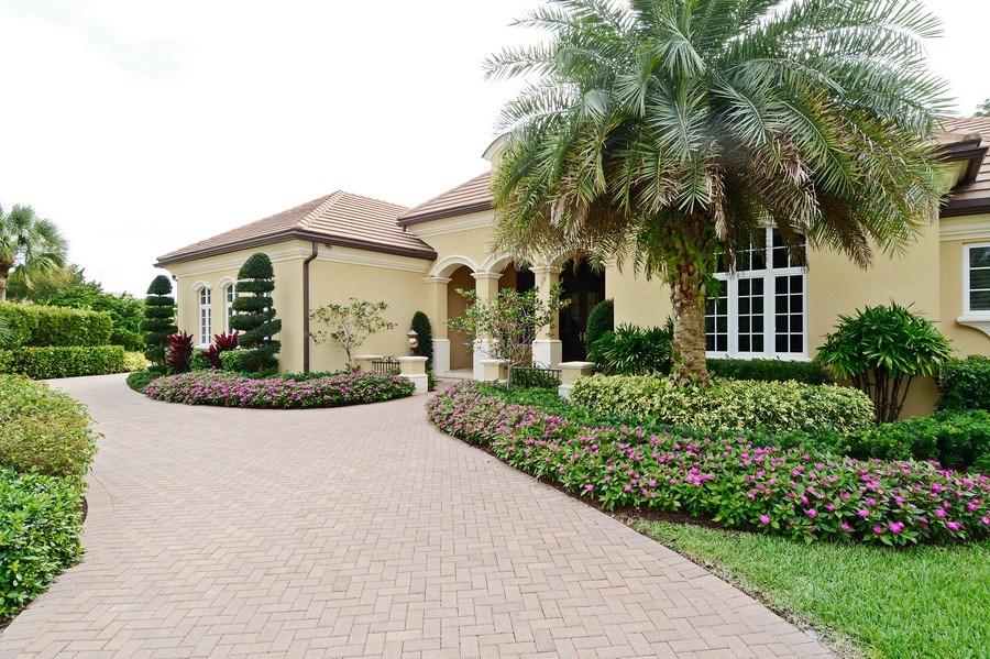7770 Old Marsh Road Palm Beach Gardens, FL 33418 - Photo 2 of 23 7770 old marsh great side driveway pictu