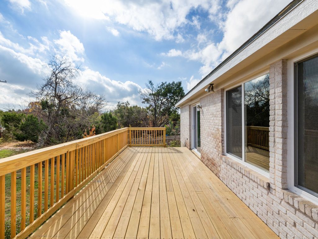 3628 Windhill Loop Round Rock, TX 78681 - Photo 22 of 24 a view of balcony with wooden floor and fence