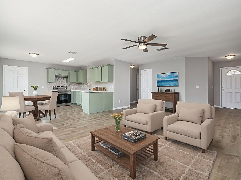 3628 Windhill Loop Round Rock, TX 78681 - Photo 6 of 24 a living room with furniture kitchen view and a chandelier