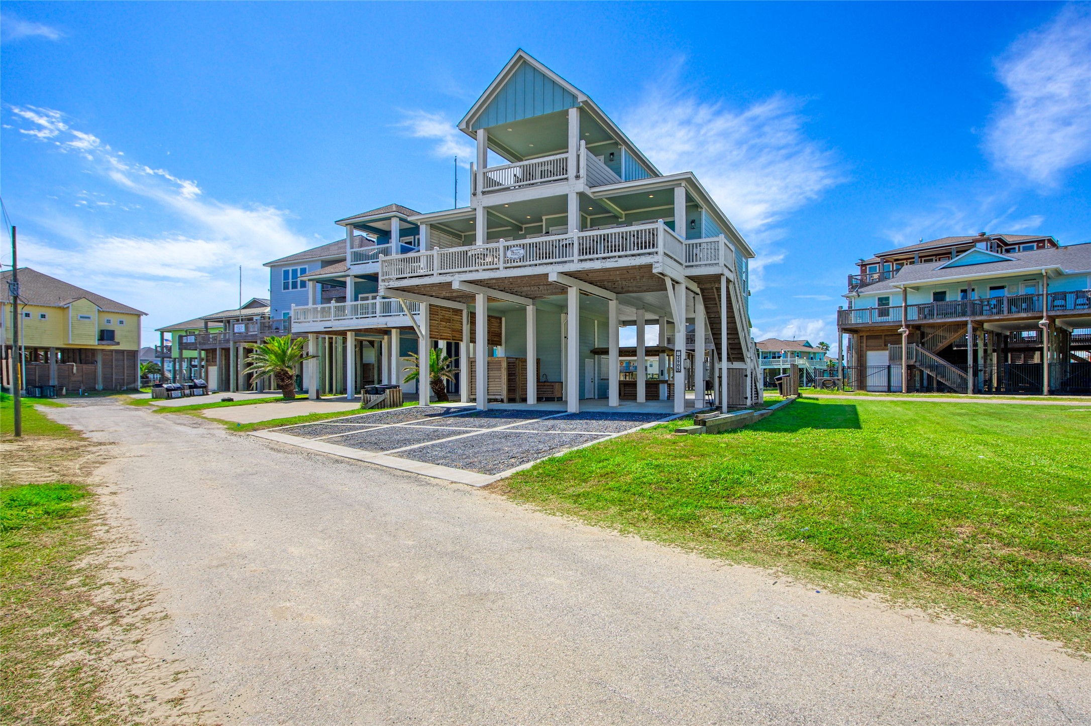 2906 Shady Lane Crystal Beach, TX 77650 - Photo 29 of 35 a front view of a house with a yard