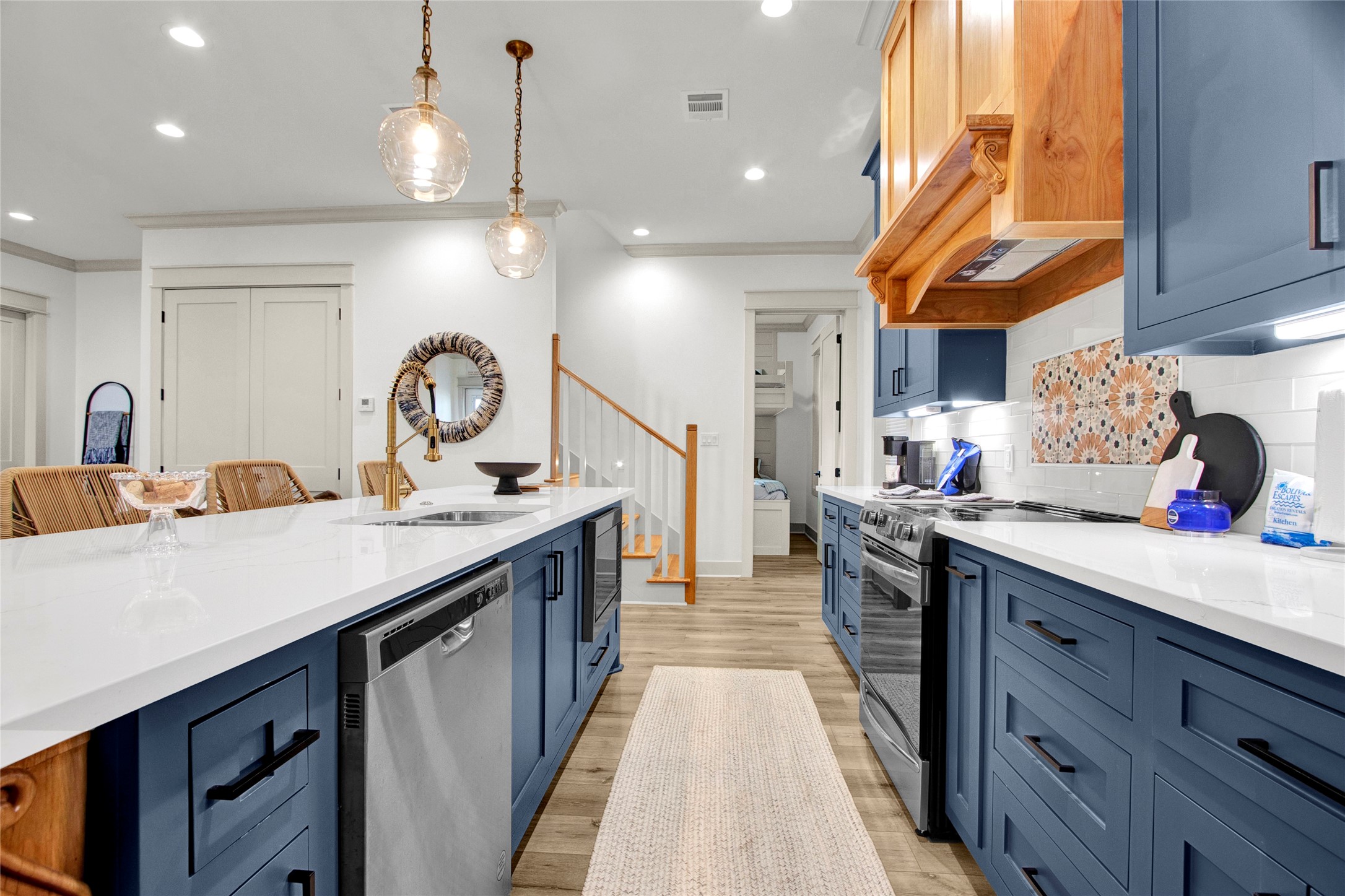 2906 Shady Lane Crystal Beach, TX 77650 - Photo 9 of 35 a kitchen with a sink and cabinets