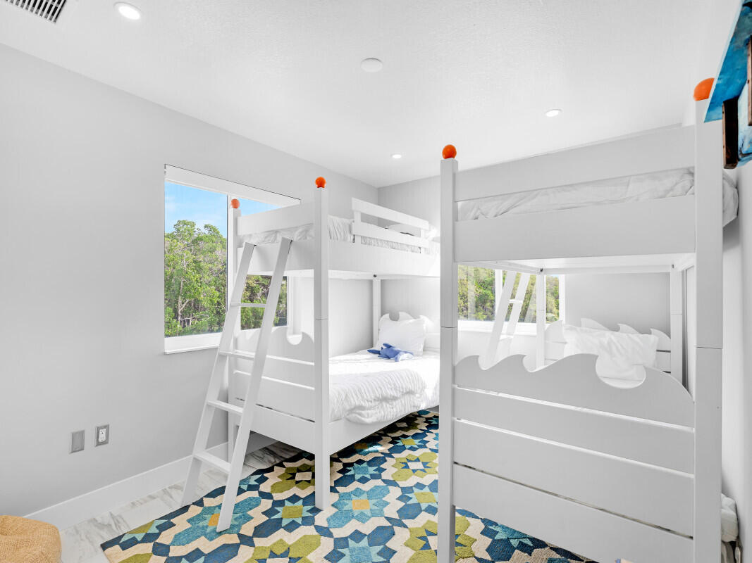 325 Calusa Street, Unit 359 Key Largo, FL 33037 - Photo 22 of 52 a living room with furniture and a table