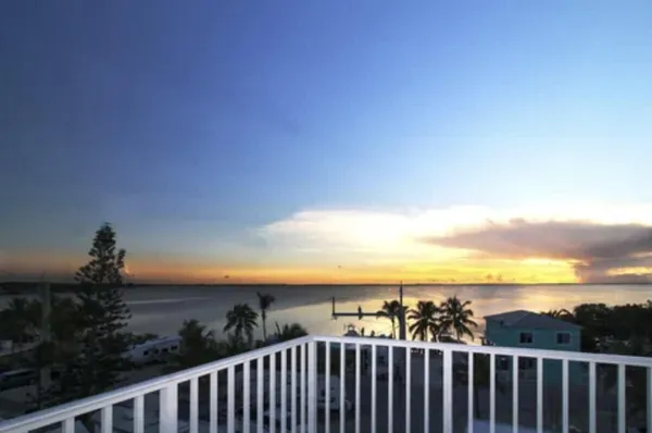 a view of a balcony with an outdoor space