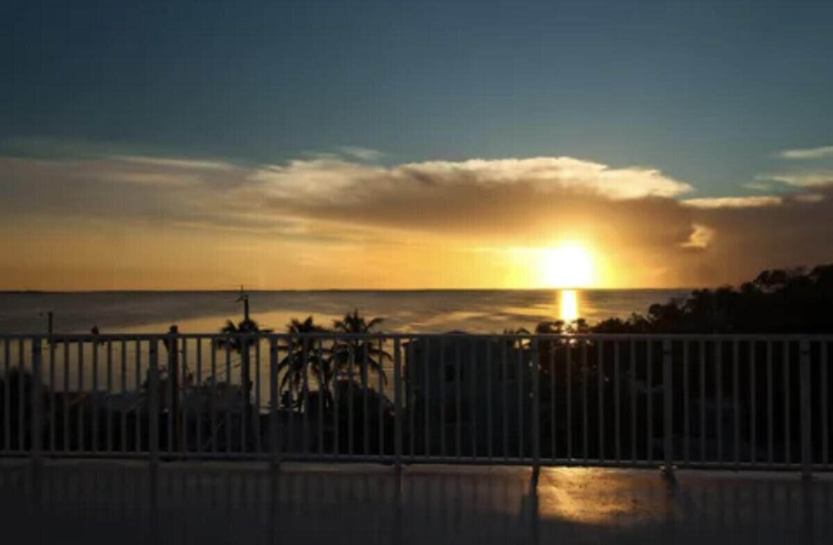 325 Calusa Street, Unit 359 Key Largo, FL 33037 - Photo 34 of 52 a view of a balcony with an outdoor space