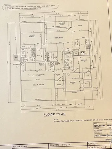 a kitchen with stainless steel appliances granite countertop a sink and a stove