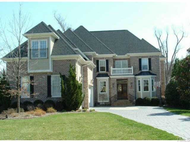 10525 Charmford Way Raleigh, NC 27615 - Photo 1 of 12 front view of house with a yard