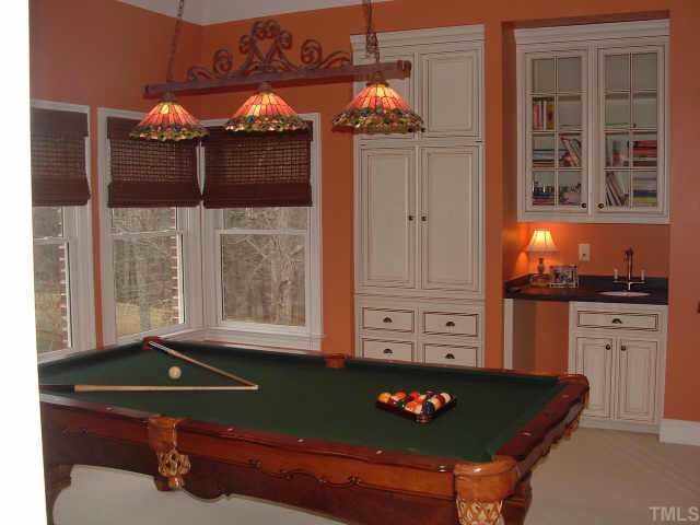 10525 Charmford Way Raleigh, NC 27615 - Photo 10 of 12 a room with furniture and window
