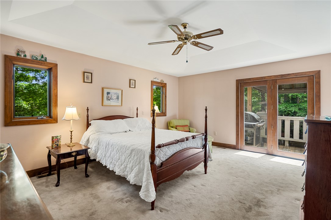 324 Hobson Road Anderson, SC 29621 - Photo 22 of 46 This tranquil bedroom features outdoor access, creating a peaceful retreat.