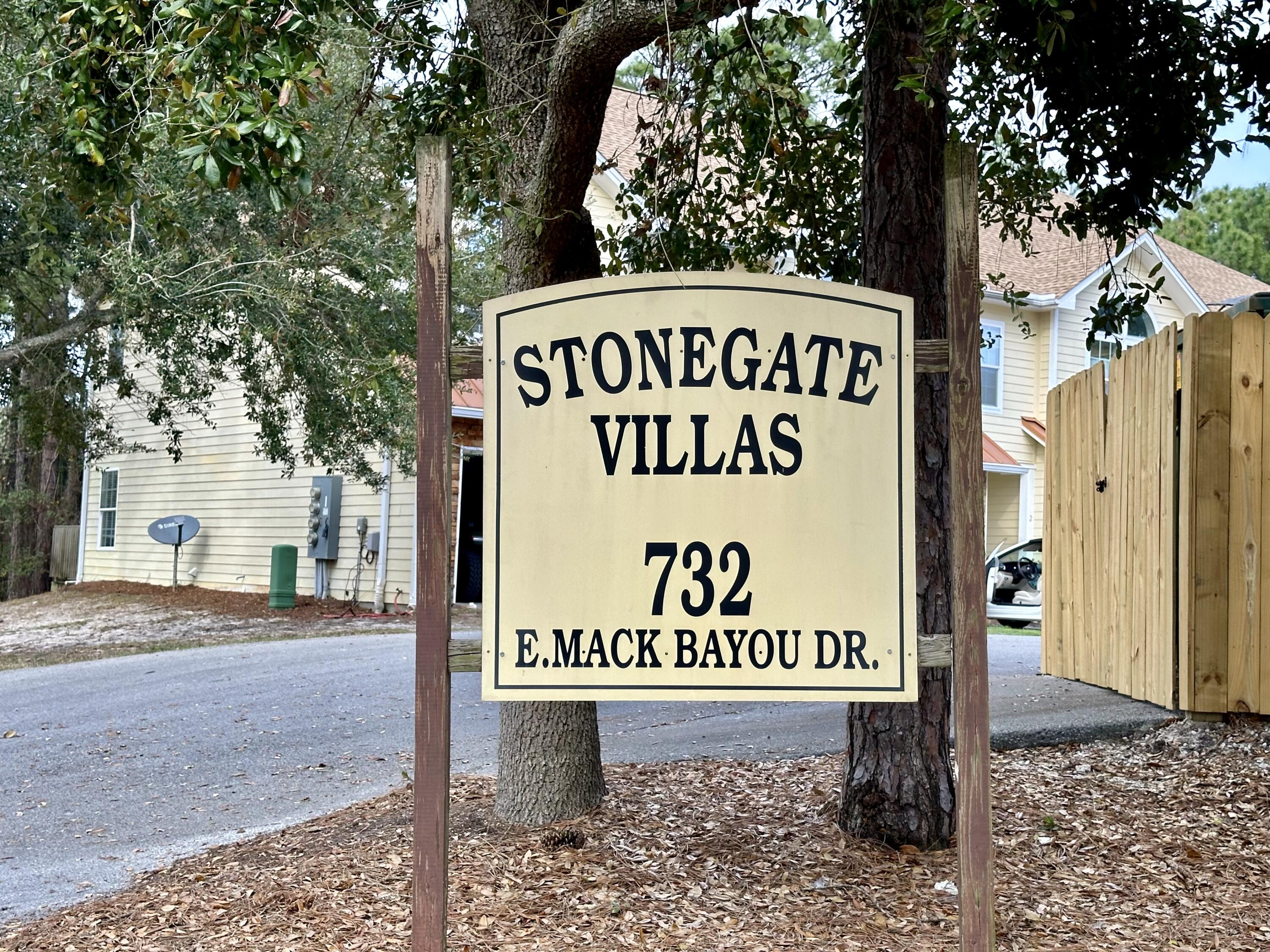 732 East Mack Bayou Drive, Unit 2 Santa Rosa Beach, FL 32459 - Photo 43 of 43 a sign that is on the side of the road
