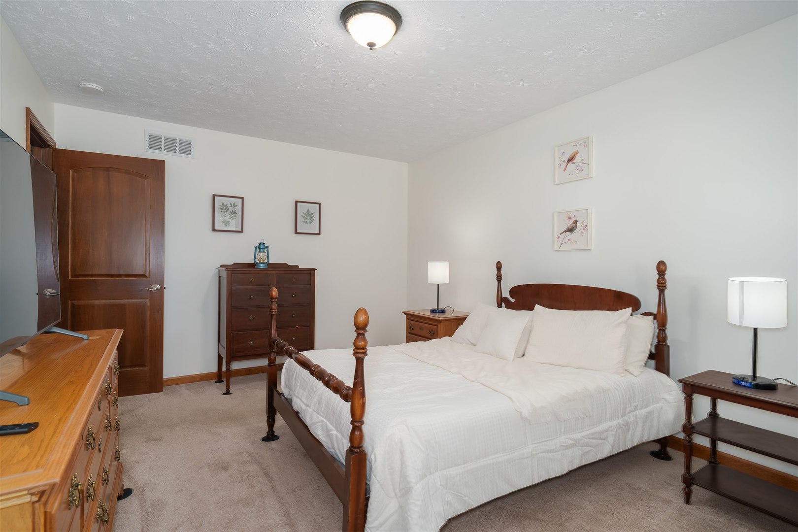 704 Franklin Way Pontiac, IL 61764 - Photo 20 of 39 a bedroom with a bed and dresser