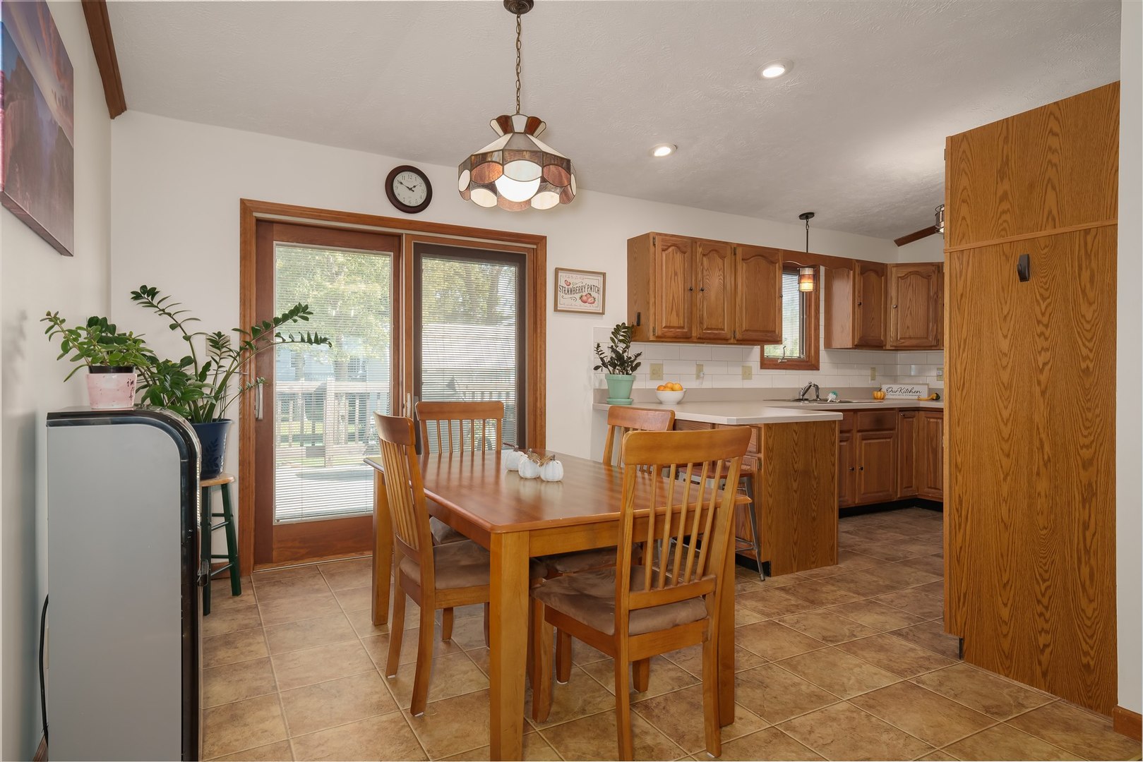 704 Franklin Way Pontiac, IL 61764 - Photo 7 of 39 a view of a dining room with furniture window and wooden floor