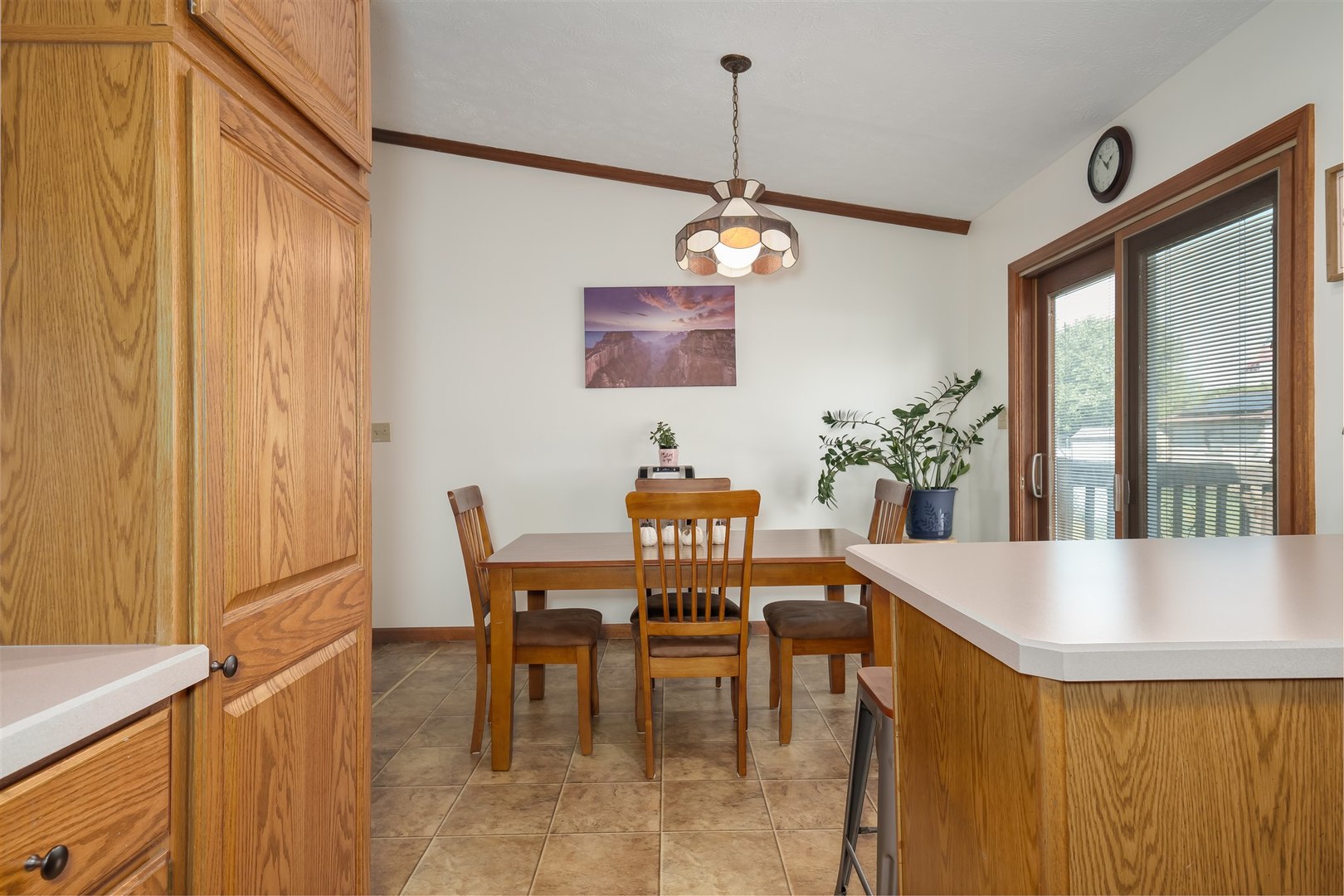 704 Franklin Way Pontiac, IL 61764 - Photo 10 of 39 a view of a dining room with furniture and window