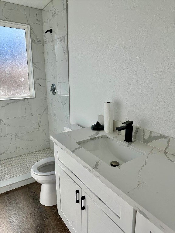 102 Georgia Street Houston, TX 77029 - Photo 12 of 15 a bathroom with a sink a toilet and shower