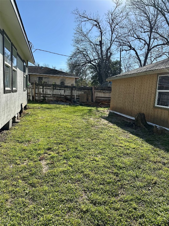102 Georgia Street Houston, TX 77029 - Photo 2 of 15 a backyard of a house with lots of green space