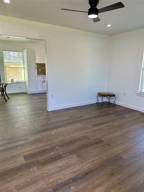 102 Georgia Street Houston, TX 77029 - Photo 3 of 15 a view of empty room with wooden floor and fan