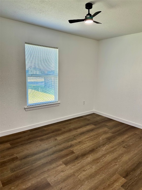 102 Georgia Street Houston, TX 77029 - Photo 10 of 15 an empty room with wooden floor and windows