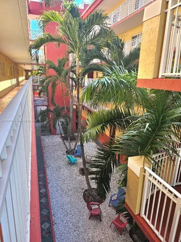 a view of a backyard with plants