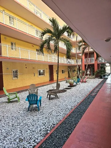 a front view of a building with glass windows