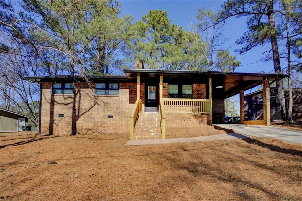 7225 Pineneedle Drive Southwest Covington, GA 30014 - Photo 1 of 37 a view of a building with a tree