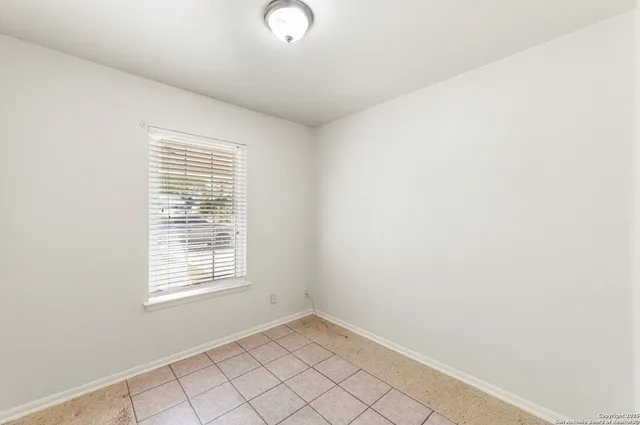 a view of an empty room with window