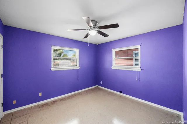 an empty room with windows